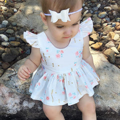 Baby Girl Dress: Floral Print and Ruffled Sleeves