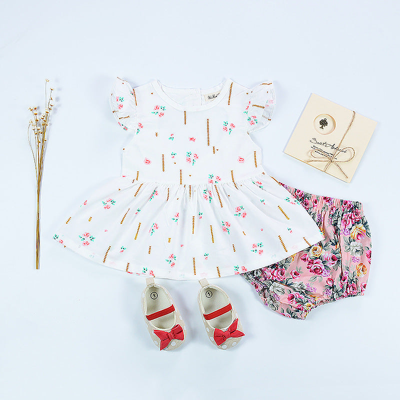 Baby Girl Dress: Floral Print and Ruffled Sleeves